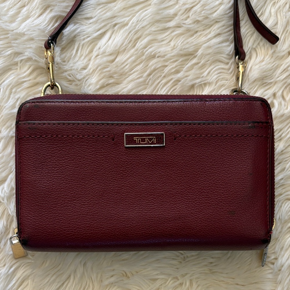 TUMI Burgundy Crossbody Leather Bag with Gold Details